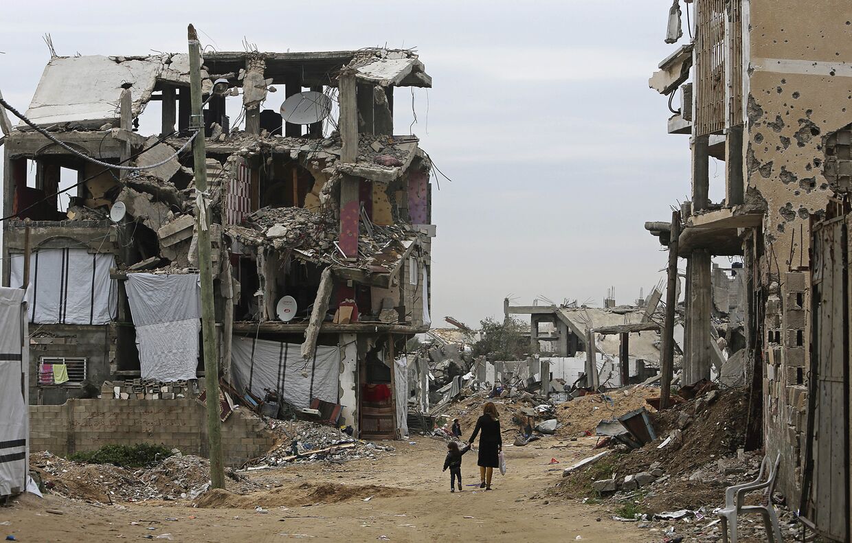 Дома в Газе, разрушенные во время израильских авиаударов летом 2014 года