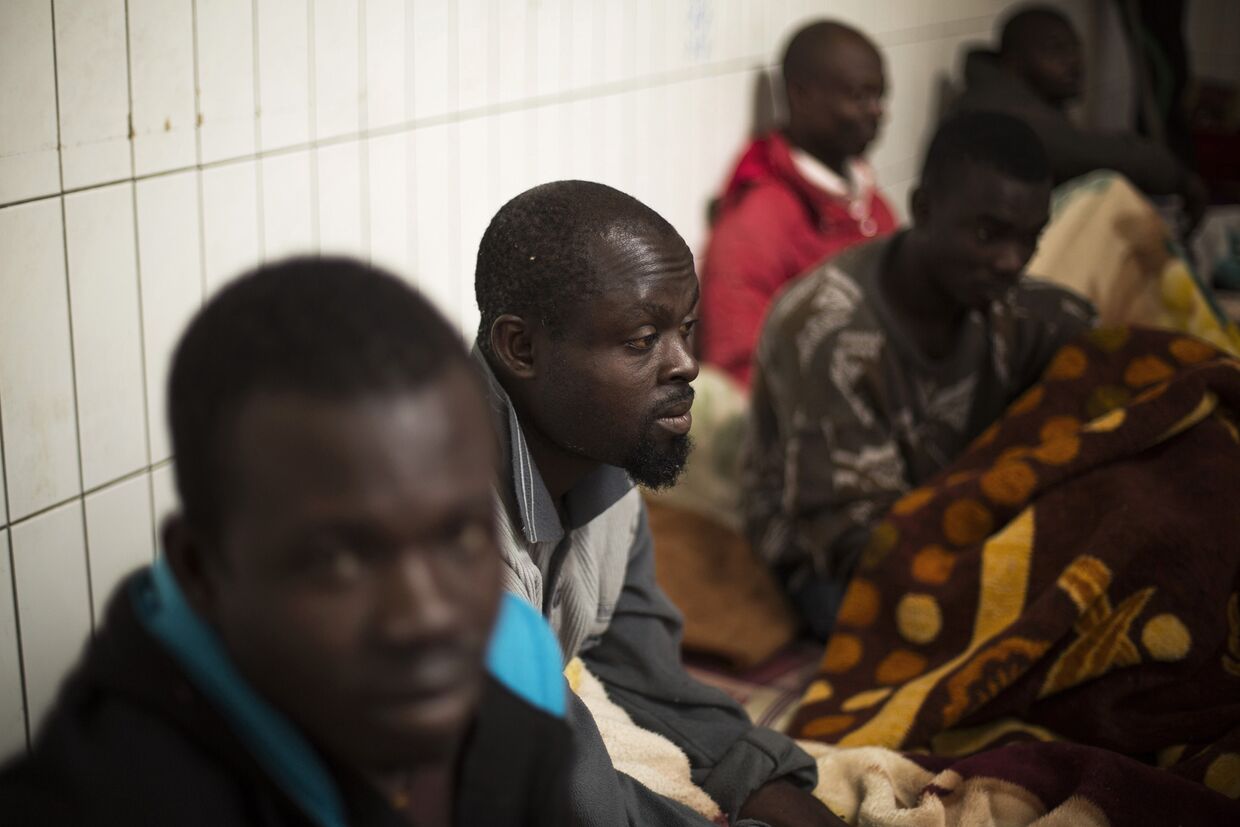 Мигранты из Ганы, Чада и Нигерии, которые пытались попасть в Европу, задержаны в Триполи, Ливия