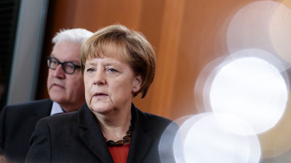 Канцлер ФРГ Ангела Меркель и министр иностранных дел Франк-Вальтер Штайнмайер
