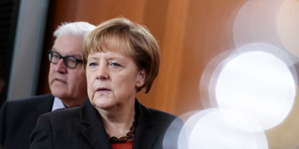 Канцлер ФРГ Ангела Меркель и министр иностранных дел Франк-Вальтер Штайнмайер