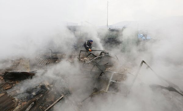 Последствия лесных пожаров в поселке Шира в Хакасии