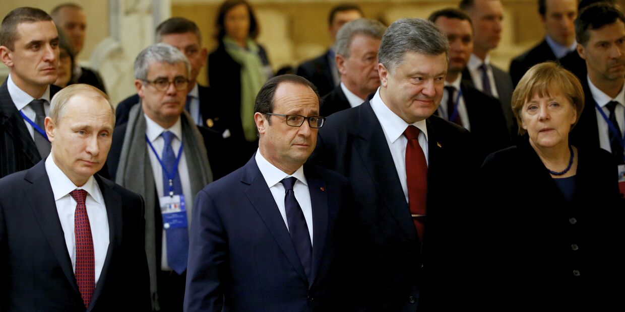 Владимир Путин, Франсуа Олланд, Петр Порошенко и Ангела Меркель во время встречи в Минске