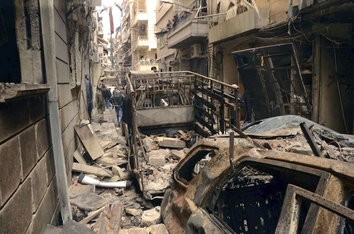 Разрушенные дома в бывшем христианском районе Алеппо