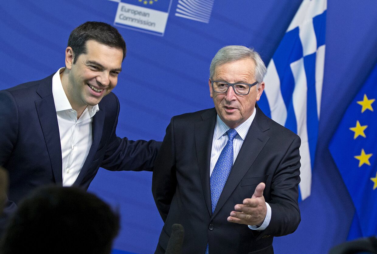 Премьер-министр Греции Алексис Ципрас и президент Европейской комиссии Жан-Клод Юнкер во время встречи в Брюсселе 22 июня 2015 года