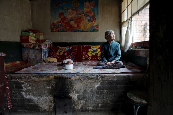 Чжан Сяньту в своем доме в городе Сиянь, провинция Шанси