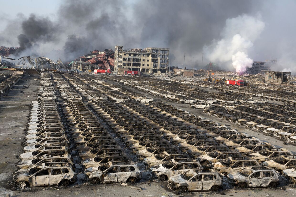 Последствия взрывов на складе в городе Тяньцзинь, Китай