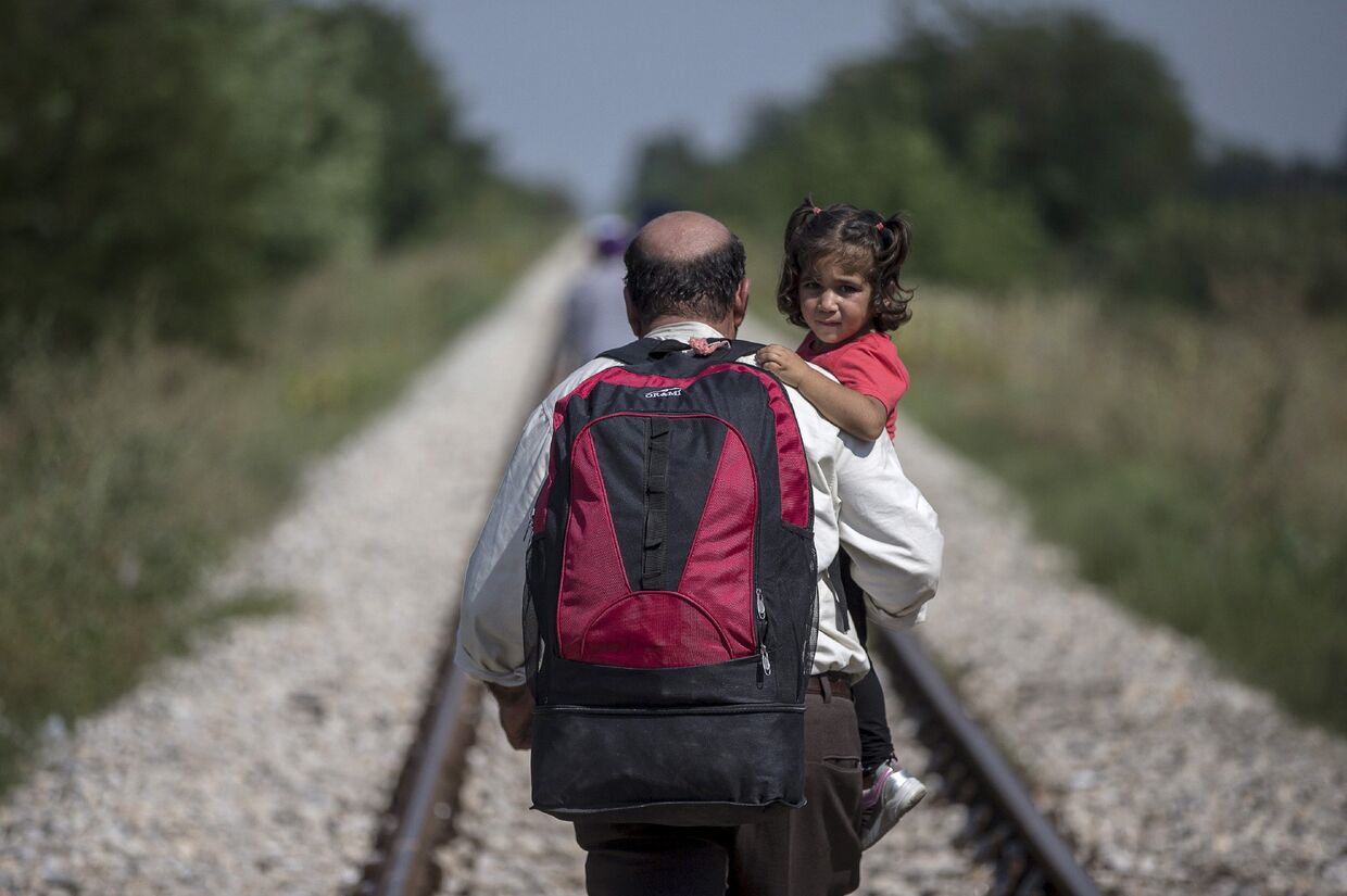 Беженцы на пути из Сербии в Венгрию. 31 августа 2015