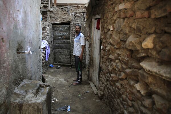 Трущобы Эшаш эль-Судан в пригороде Гизы Докки