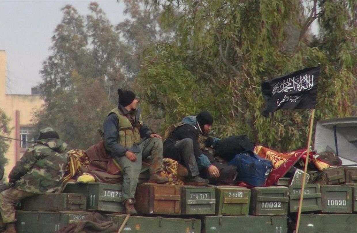 Боевики «Фронта ан-Нусра» на авиабазе Тафтаназ в провинции Идлиб на севере Сирии