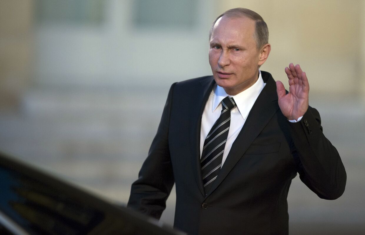 Владимир Путин покидает Елисейский дворец после встречи «нормандской четверки»