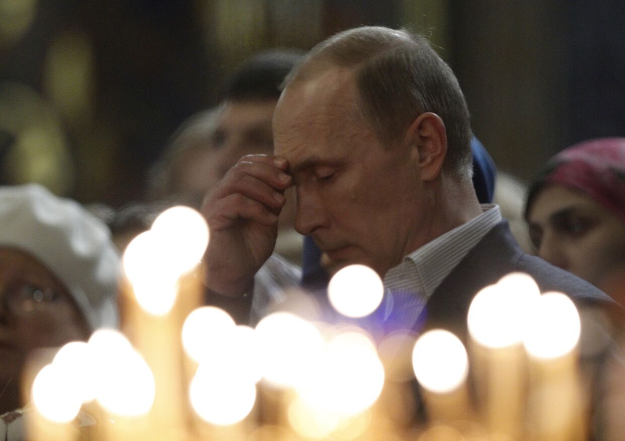 Владимир Путин на рождественской службе в Сочи