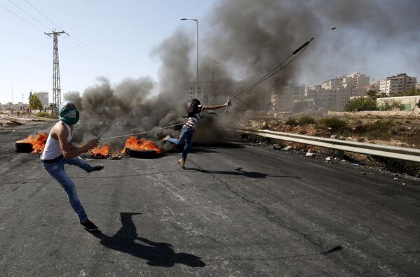 Столкновения палестинцев с израильской полицией рядом с городом Бейт-Эль