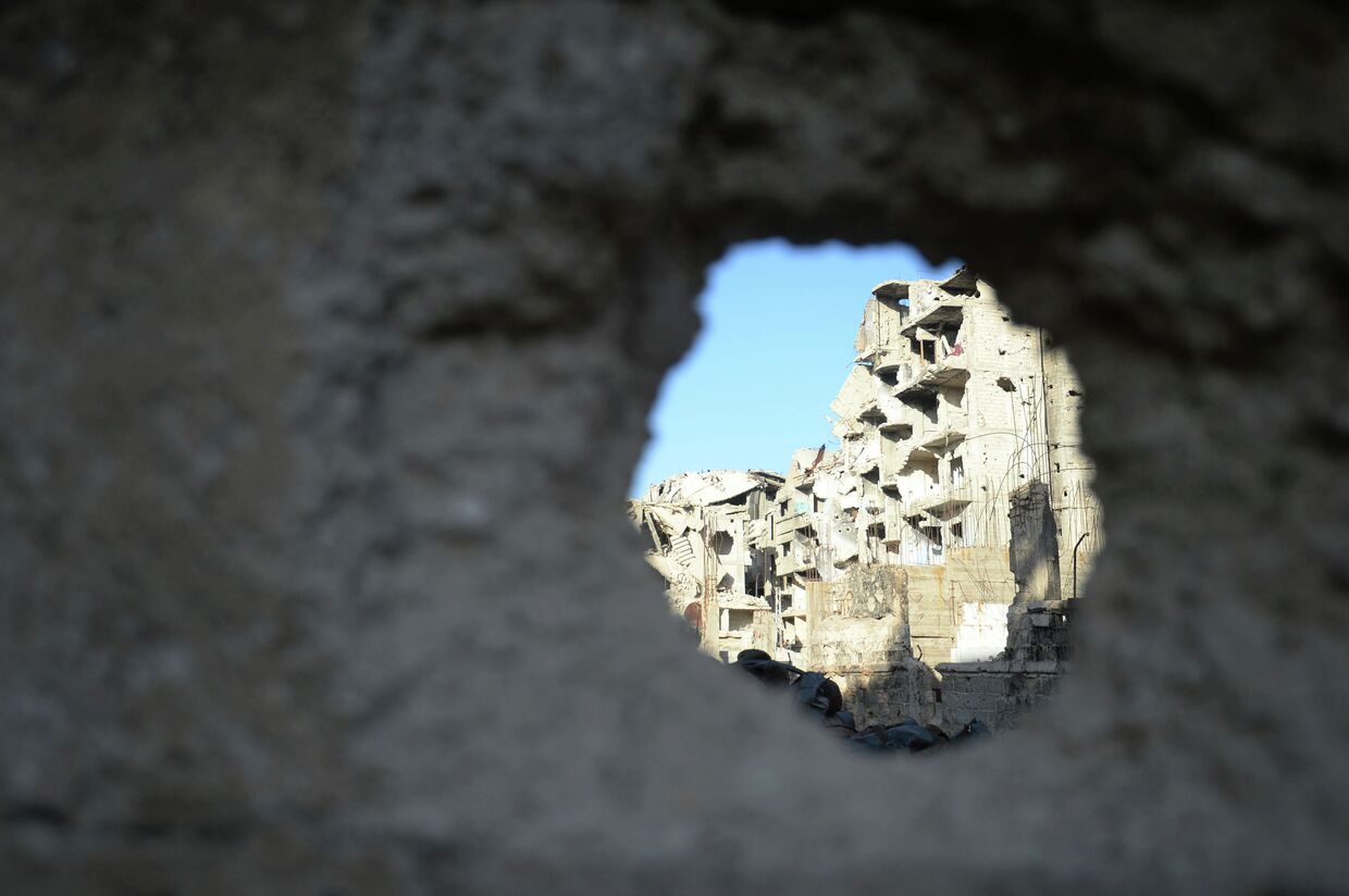 Разрушенные здания в районе Дахания в Дамаске