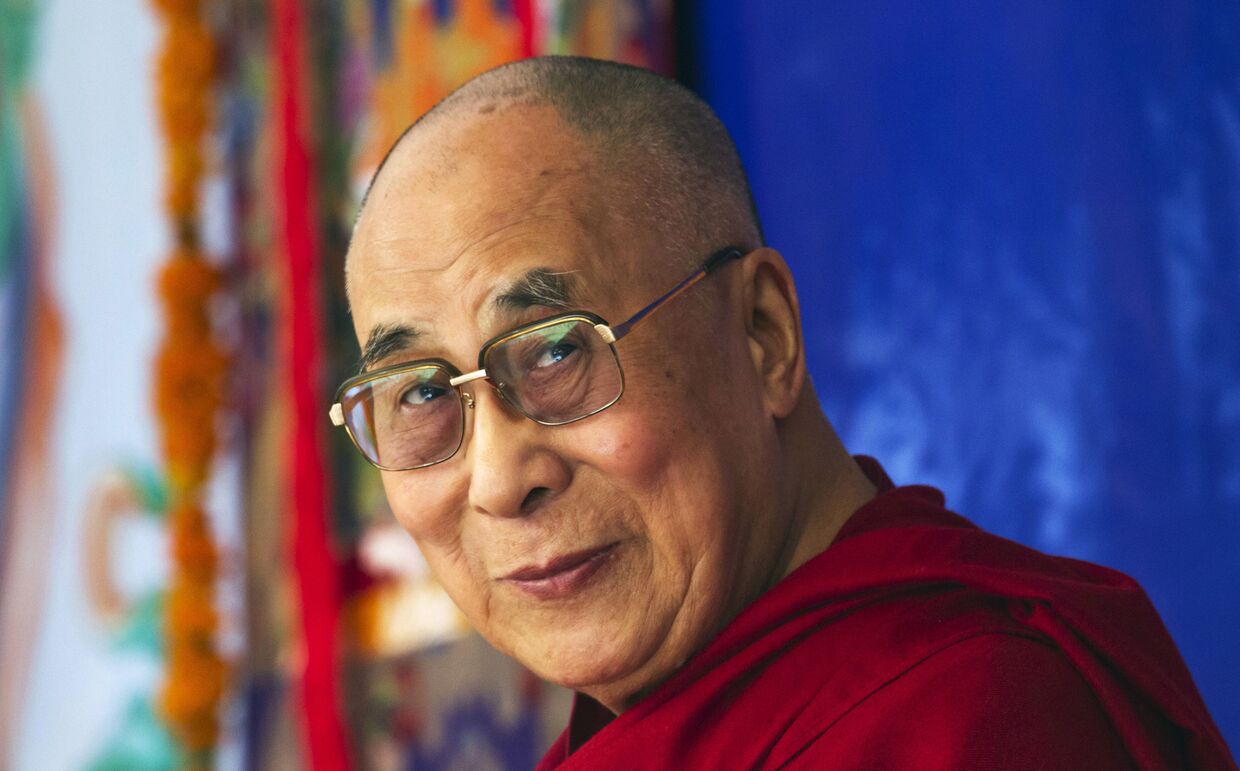 Духовный лидер последователей тибетского буддизма Далай-лама XIV