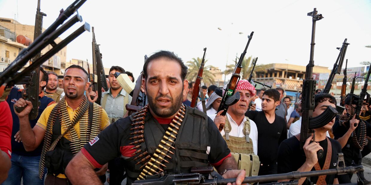 Иракские бойцы шиитского племенного ополчения, присоединившиеся к государственным войскам в борьбе против «Исламского государства»