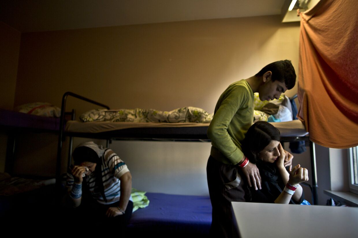 Семья мигрантов во временном доме в Германии