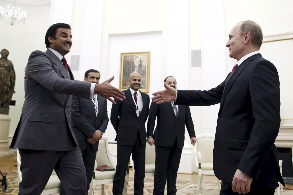 Президент России Владимир Путин и эмир Катара шейх Тамим бен Хамад Аль Тани во время встречи в Кремле.