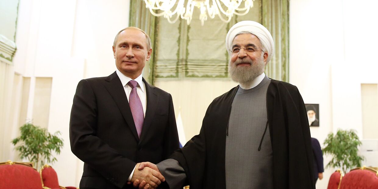 Президент России Владимир Путин и президент Ирана Хасан Рухани на встрече в Тегенане, Иран