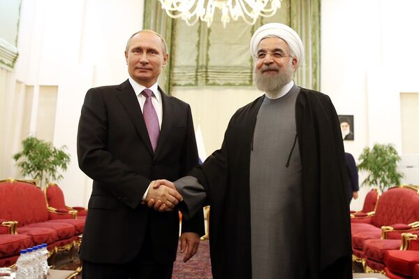 Президент России Владимир Путин и президент Ирана Хасан Рухани на встрече в Тегенане, Иран Президент России Владимир Путин и президент Ирана Хасан Рухани на встрече в Тегенане, Иран