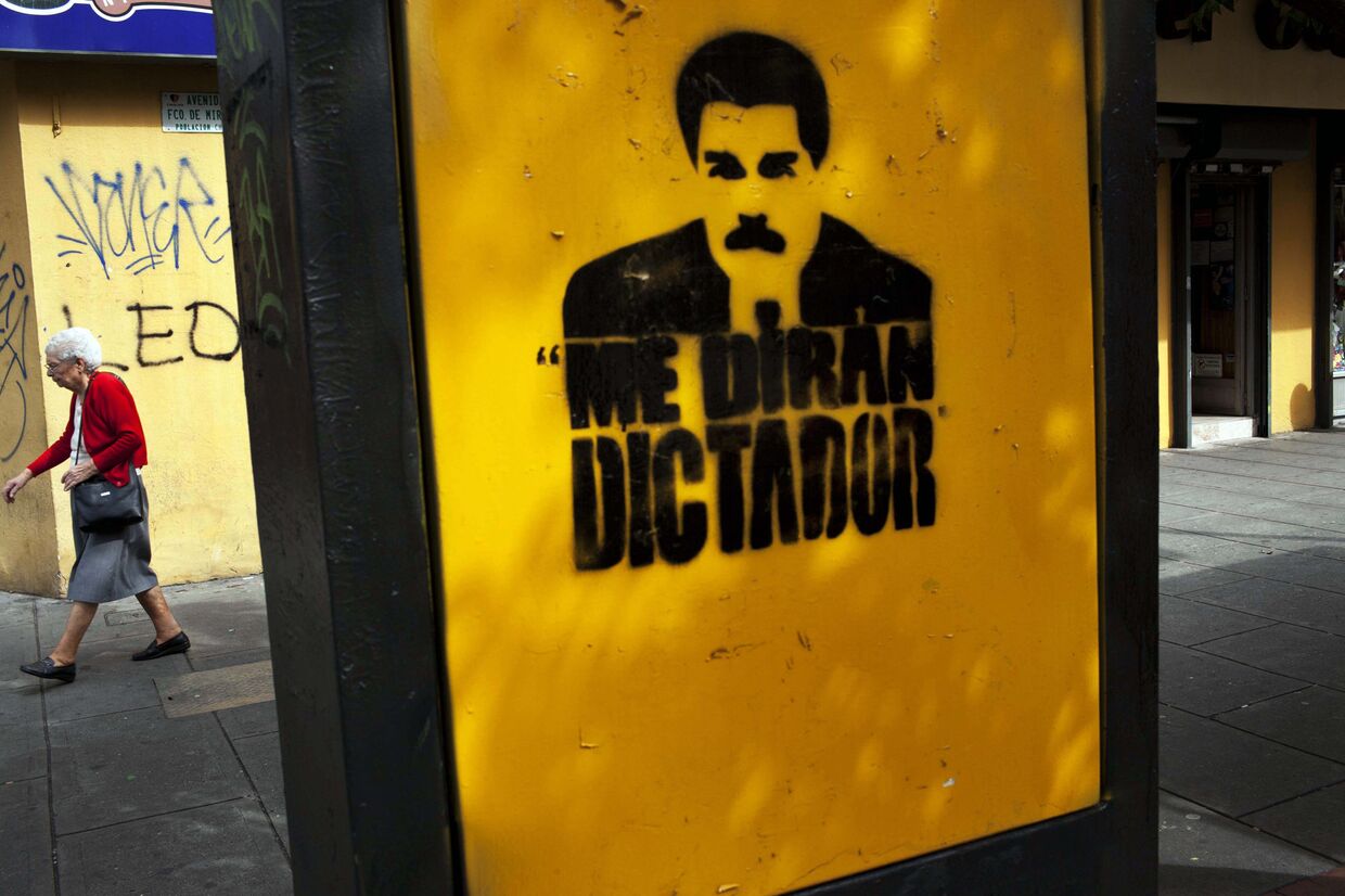 Граффити с изображением портрета президента Венесуэлы Николаса Мадуро