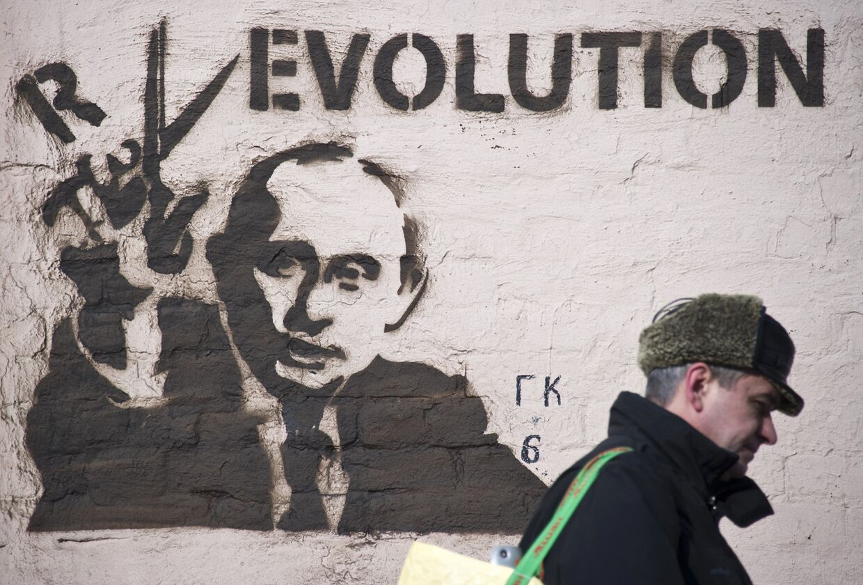 Граффити с изображением президента России Владимира Путина в Москве