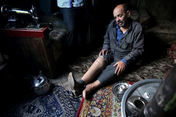 Инвалид Шахрур у себя дома, Ирбин, Сирия