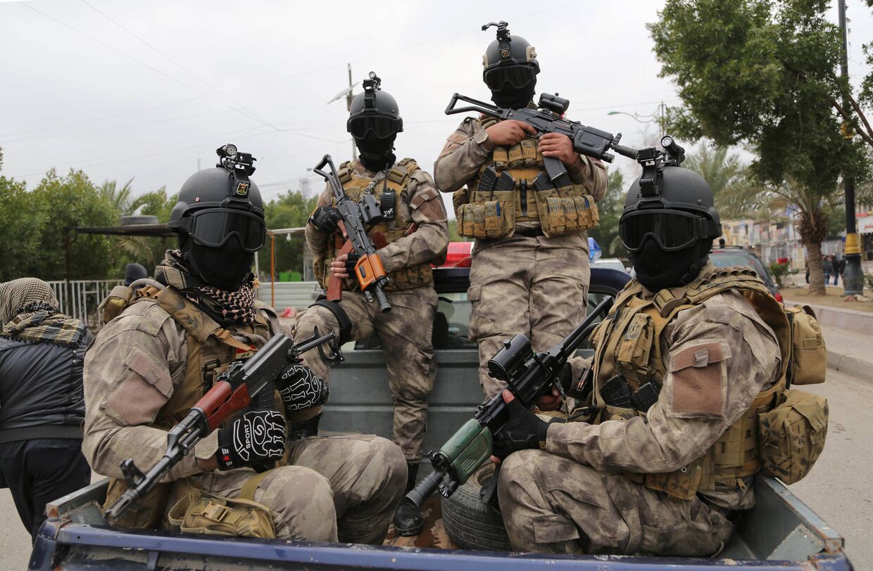 Члены «Бригады мира», шиитской повстанческой группировки в Багдаде