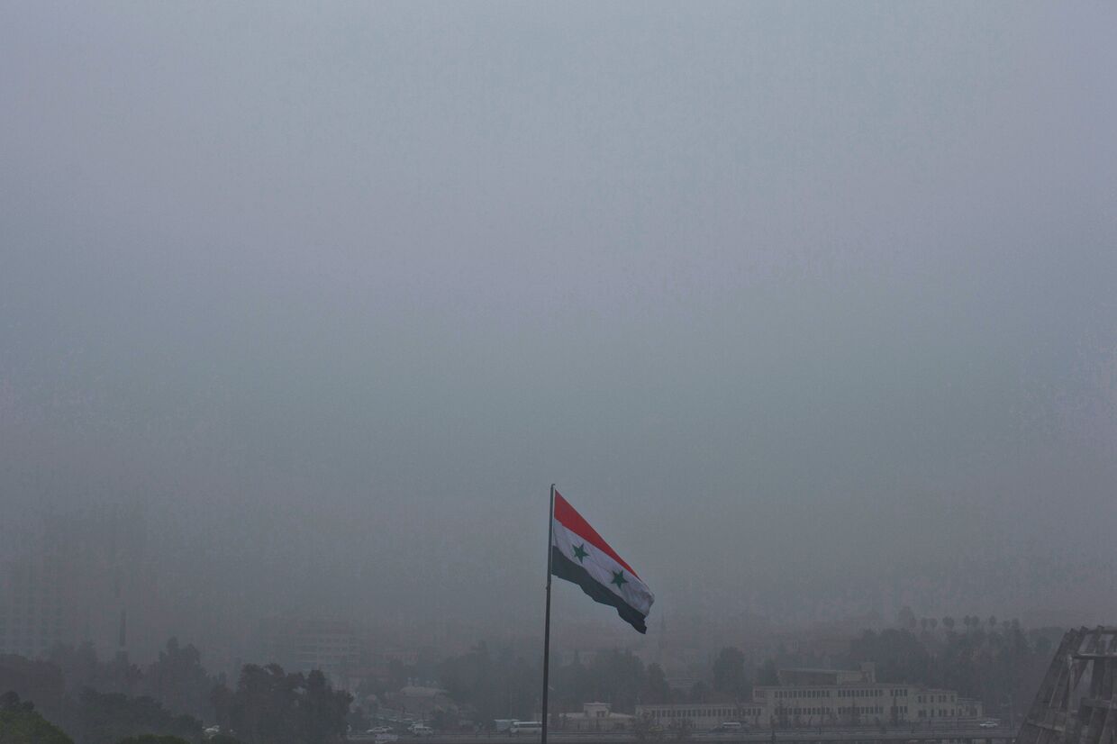 Сирийский флаг развивается над Дамаском
