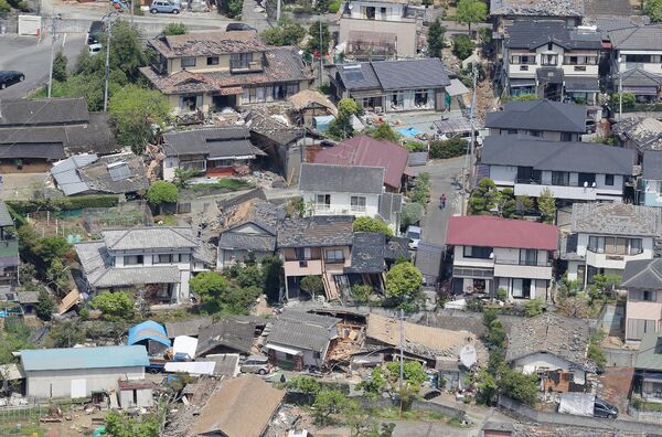 Разрушенные в результате землетрясения здания. Кумамото, Япония. Апрель 2016