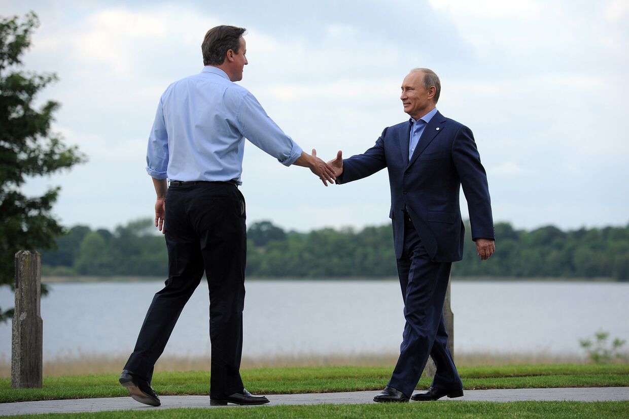 Британский премьер-министр Дэвид Кэмерон и президент России Владимир Путин