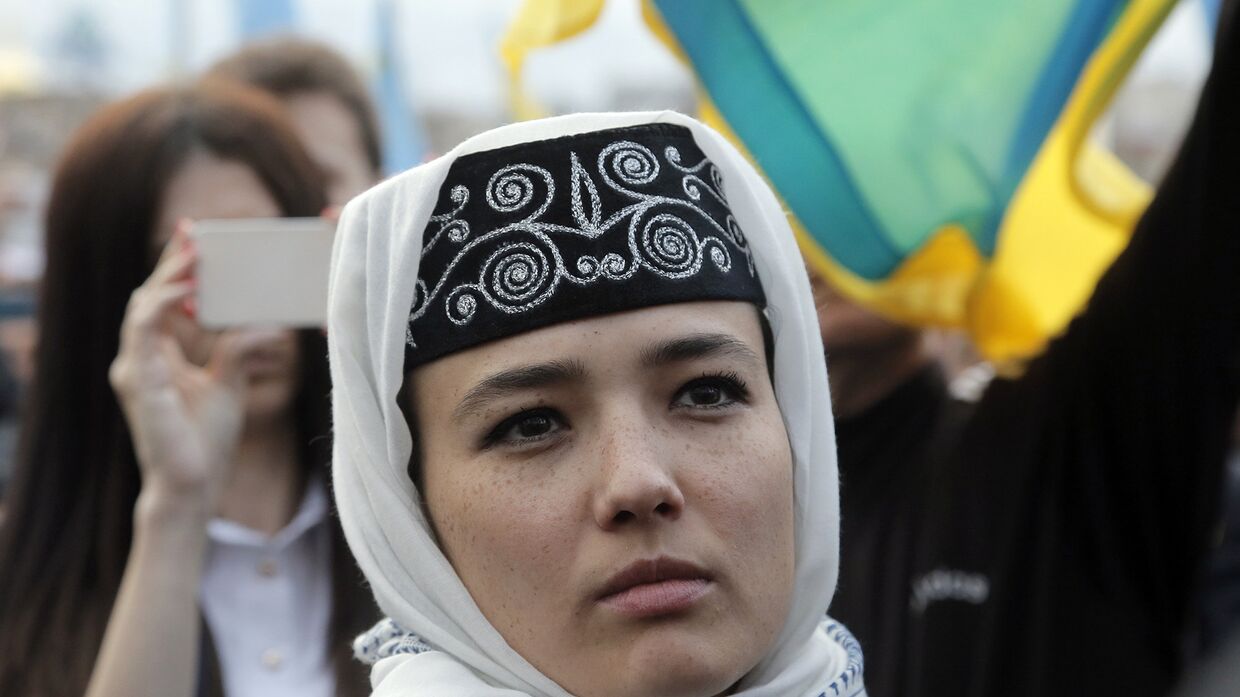 Крымские татары на акции памяти в центре Киева, посвященной 72-й годовщине депортации