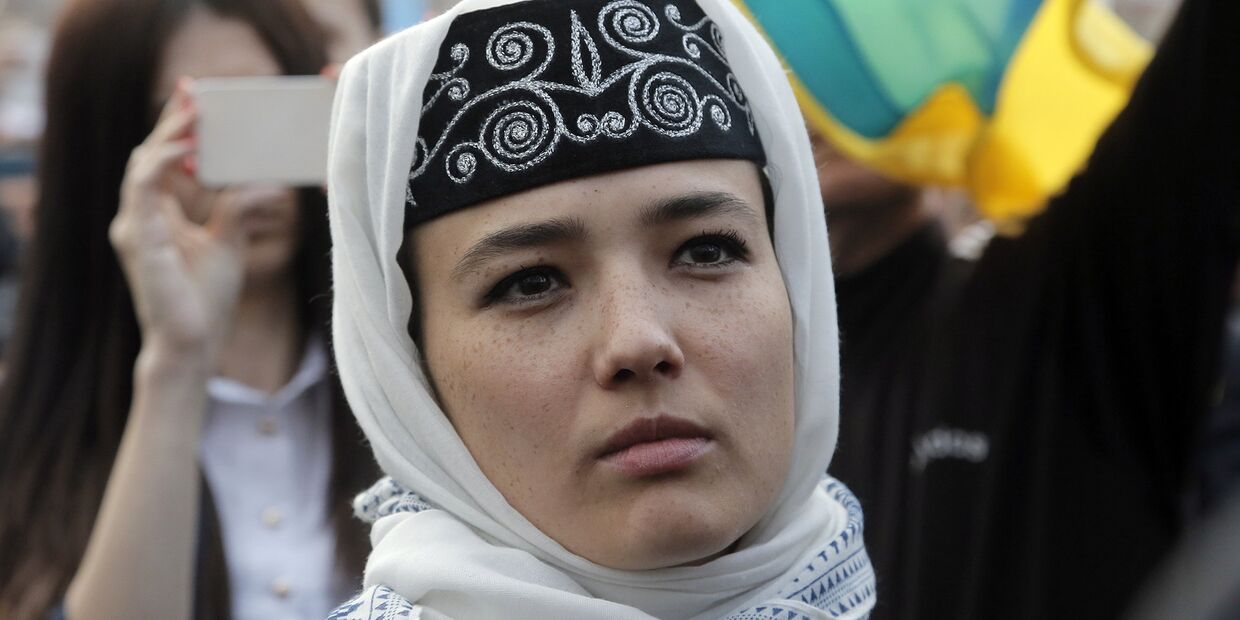 Крымские татары на акции памяти в центре Киева, посвященной 72-й годовщине депортации