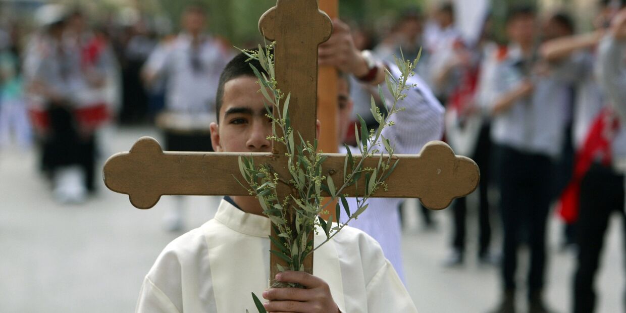 Палестинские христиане на церемонии, посвященной Пальмовому воскресенью