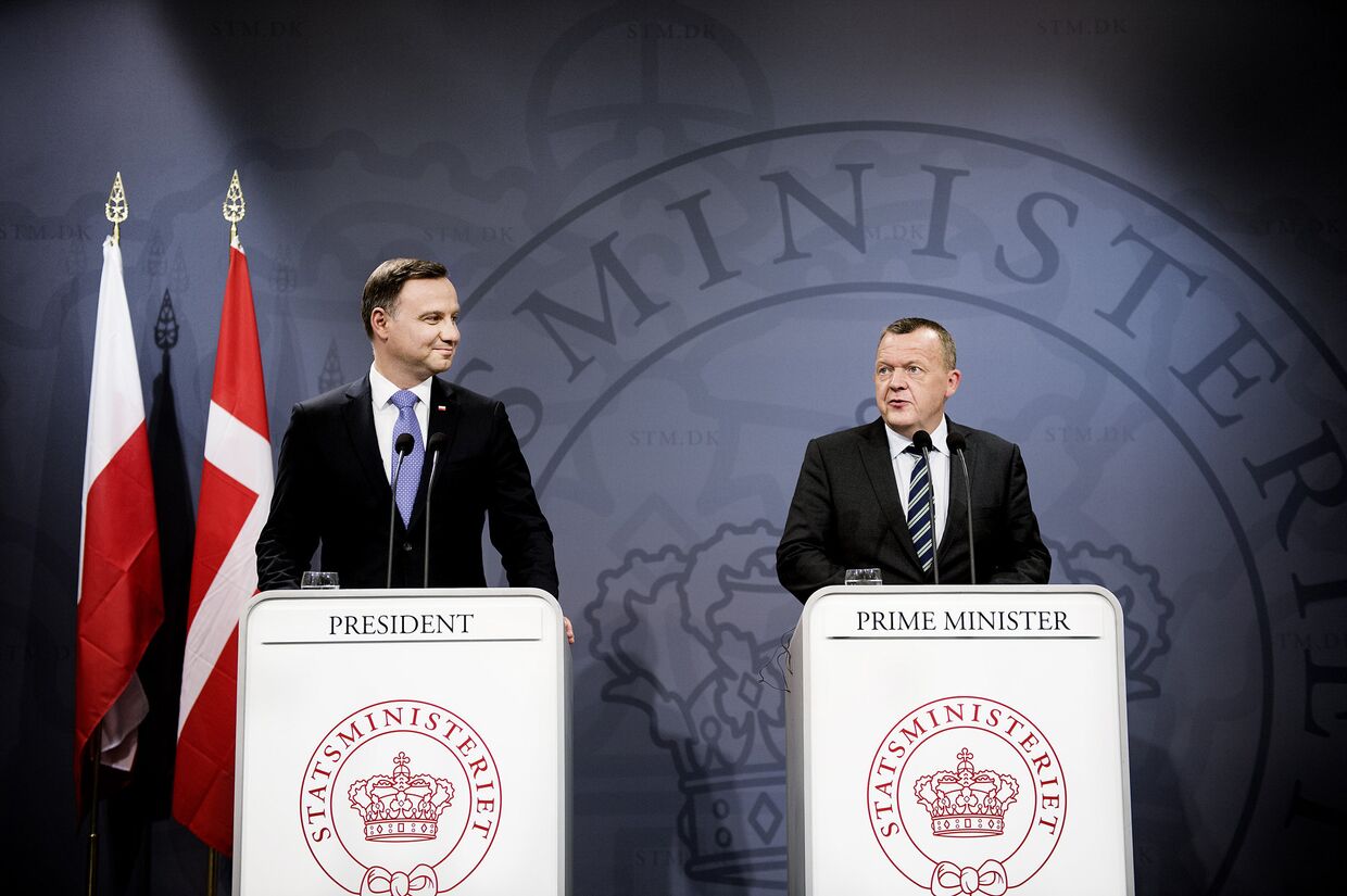 Премьер-министр Дании Ларс Лёкке Расмуссен и президент Польши Анджей Дуда