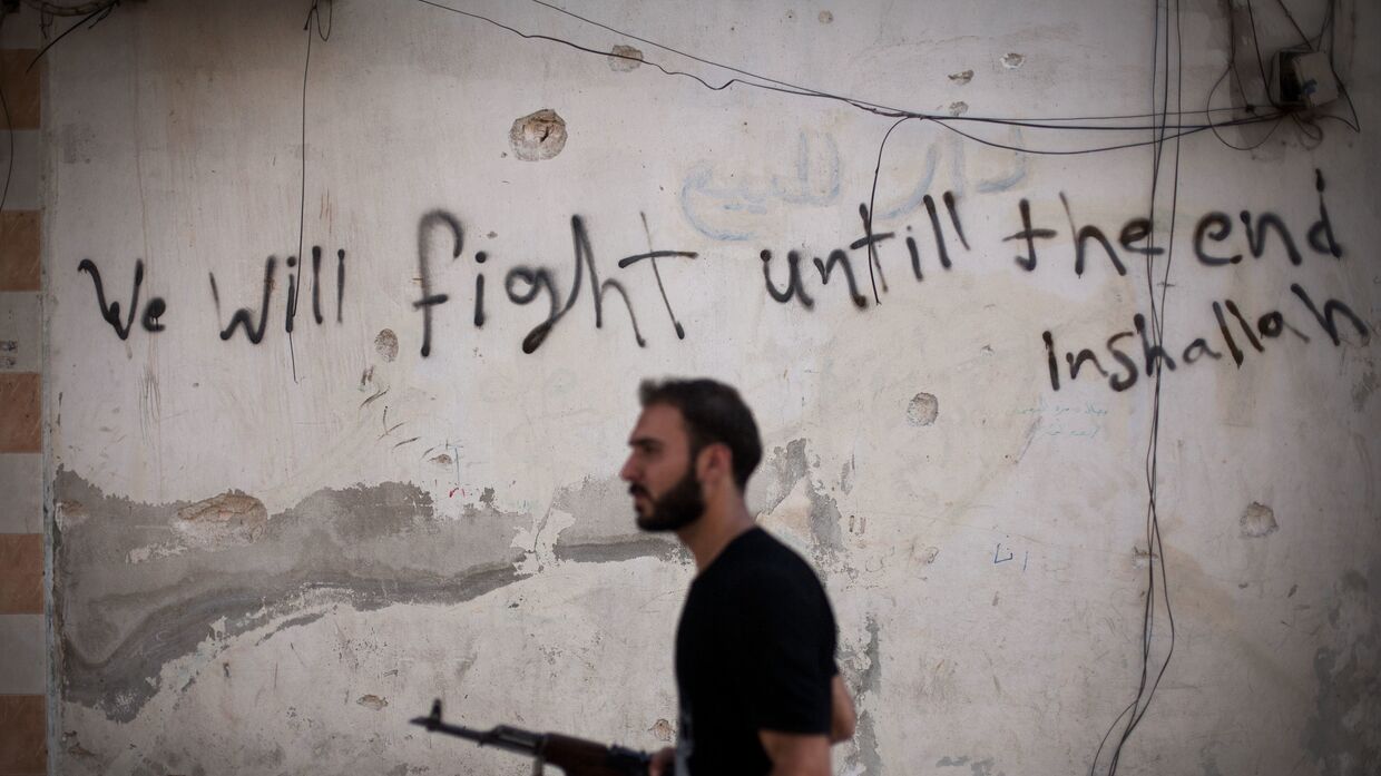 Боец Свободной сирийской армии в Алеппо, 2012 год
