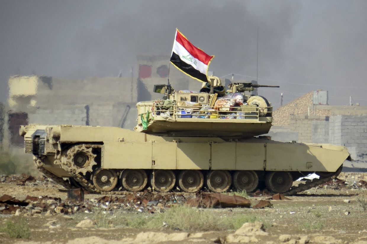 Иракские войска ведут бои с боевиками ИГ при поддержке ВВС США в провинции Акбар
