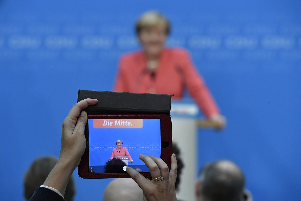 Канцлер Германии Ангела Меркель во время пресс-конференции в Берлине после региональных выборов