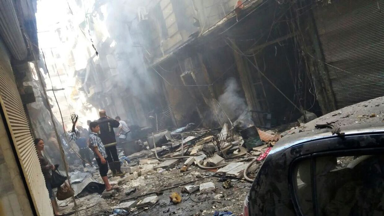 Последствия минометного обстрела христианского квартала Мидан в Алеппо