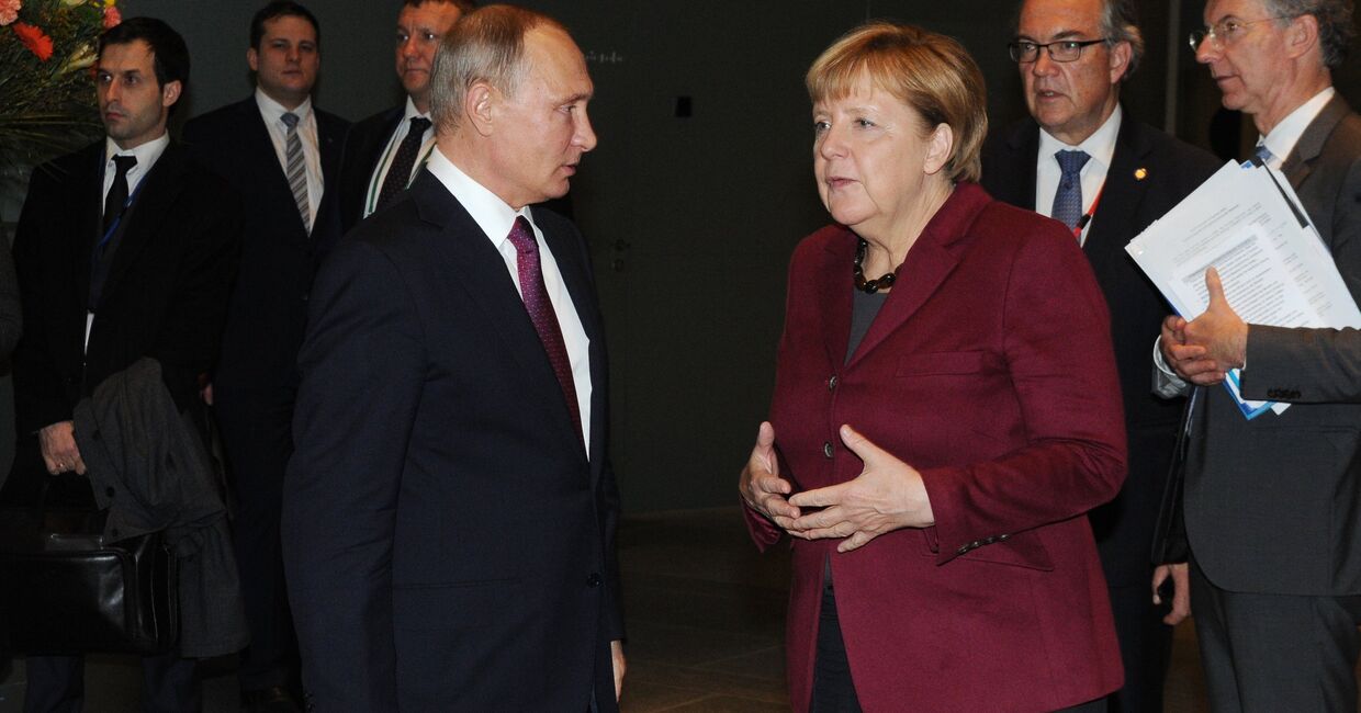 Президент РФ Владимир Путин и федеральный канцлер Германии Ангела Меркель