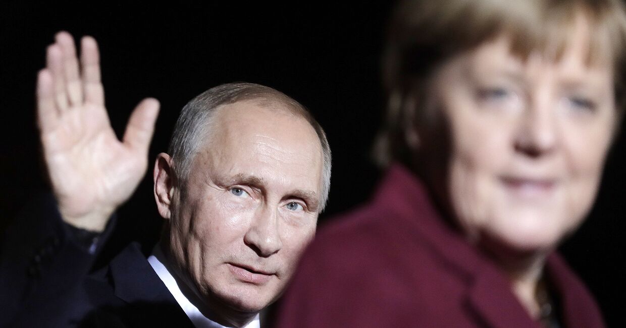 Президент России Владимир Путин и канцлер ФРГ Ангела Меркель в Берлине