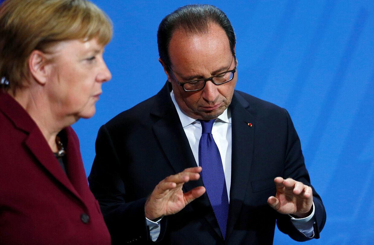 Канцлер Германии Ангела Меркель и президент Франции Франсуа Олланд на пресс-конференции
