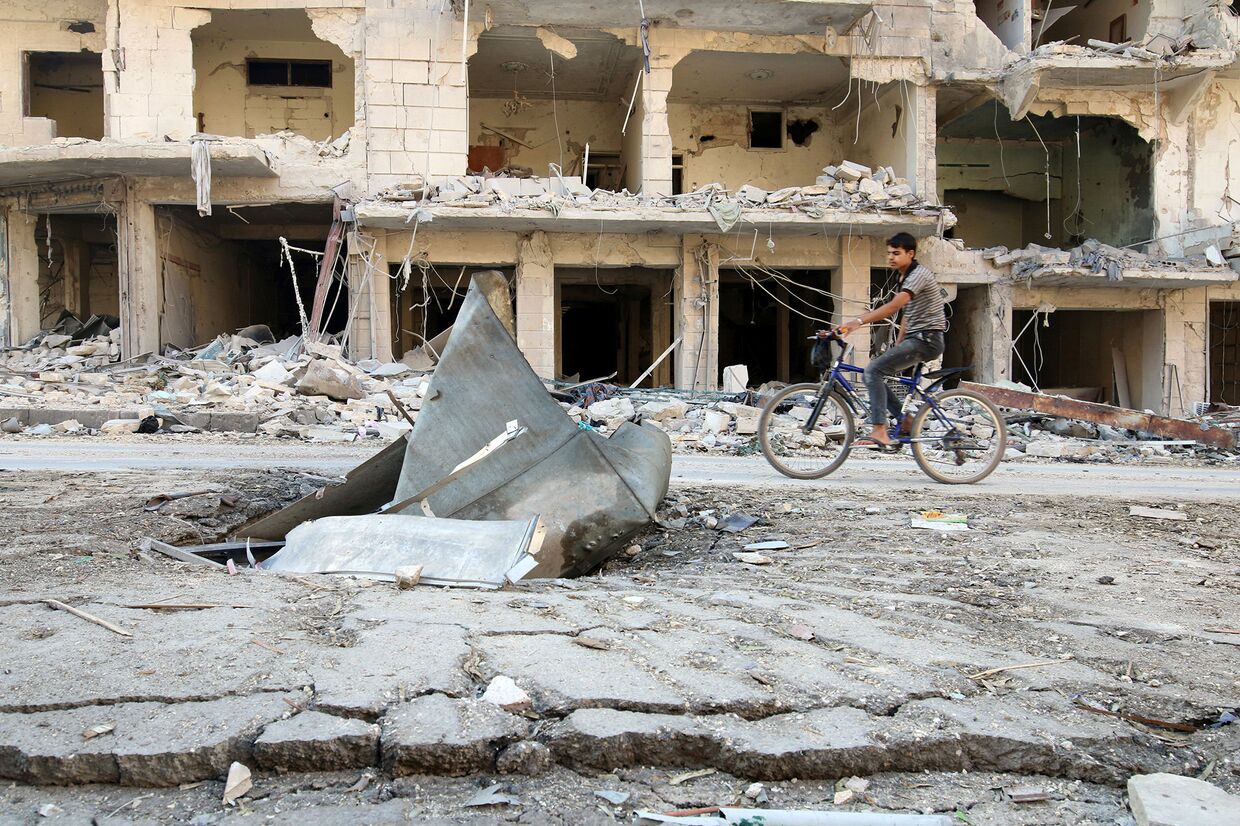 Руины в районе Аль-Суккари в Алеппо
