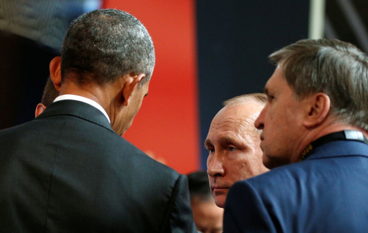 Российский президент Владимир Путин и американский лидер Барак Обама на саммите АТЭС в Перу