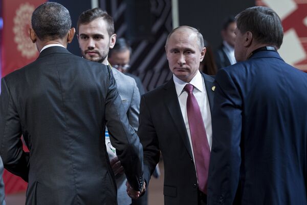 Президент США Барак Обама и президент РФ Владимир Путин на саммите АТЭС Президент США Барак Обама и президент РФ Владимир Путин на саммите АТЭС