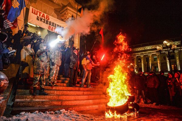 Участники акции, посвященной годовщине начала событий на Майдане Участники акции, посвященной годовщине начала событий на Майдане