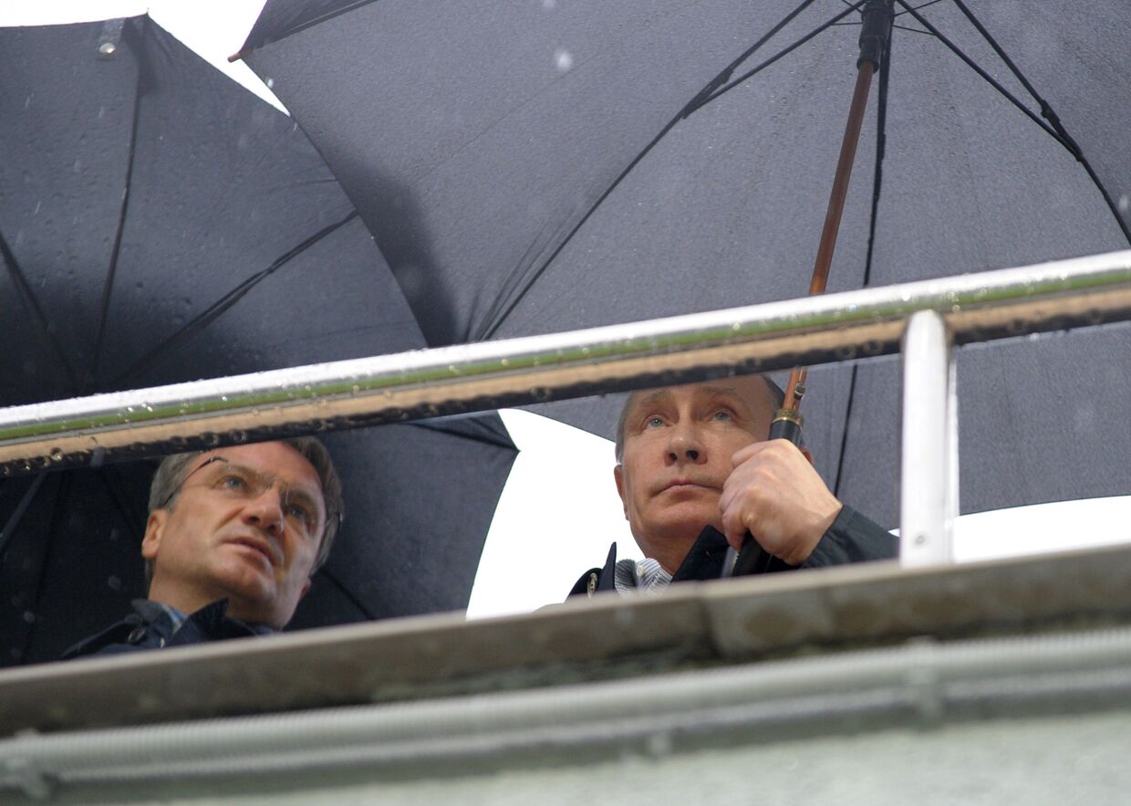 Президент России Владимир Путин и председатель правления Сбербанка России Герман Греф