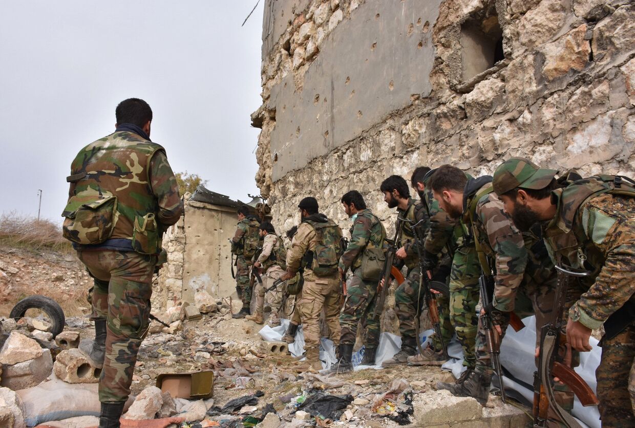 Военные сирийской армии в одном из восточных районов Алеппо