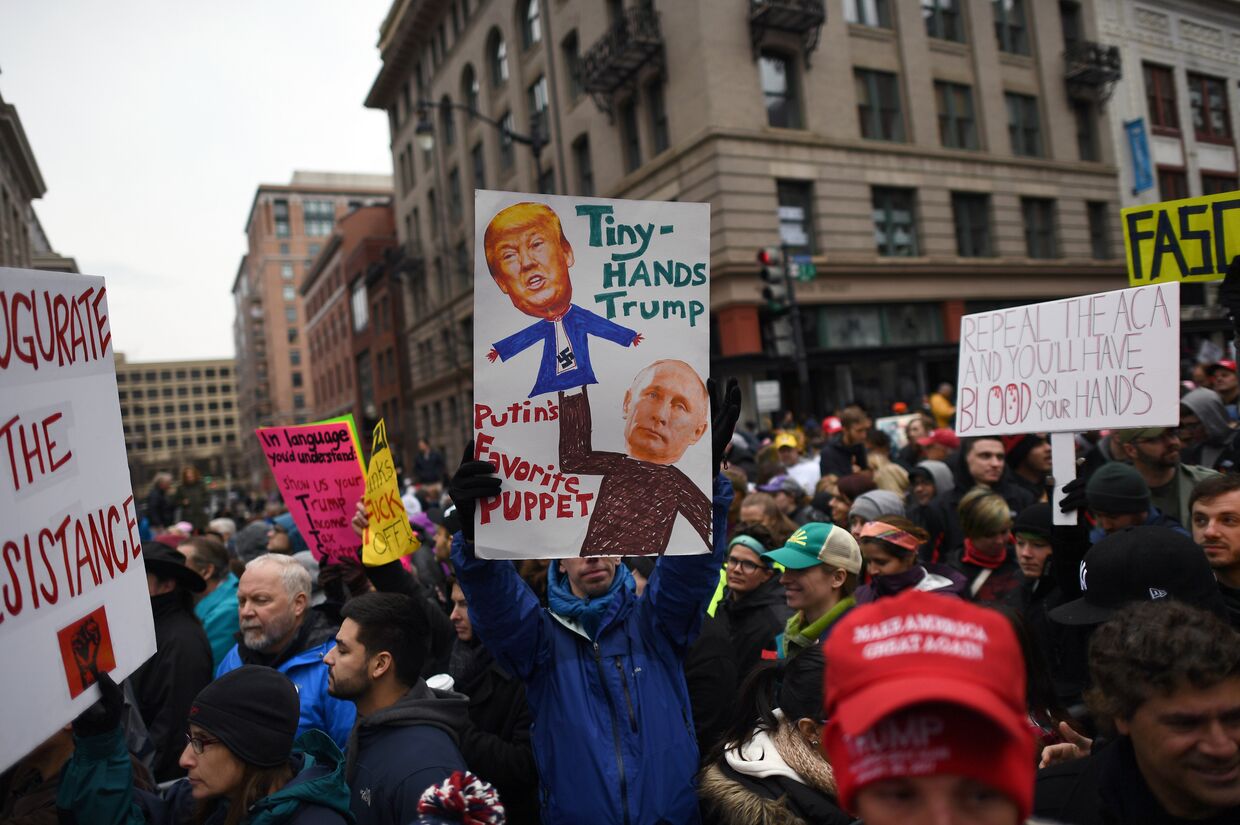 Протесты на улицах Вашингтона во время инаугурации избранного президента США Дональда Трампа. 20 января 2017 года
