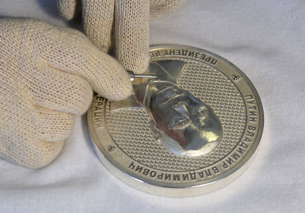 Изготовление коллекционной медальной монеты с изображением президента РФ Владимира Путина