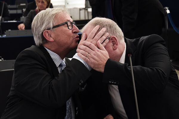 Председатель Еврокомиссии Жан-Клод Юнкер и первый вице-президент Европейской комиссии Франс Тиммерманс